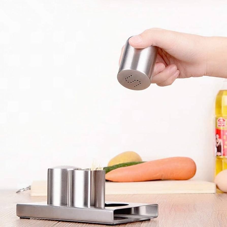Stainless steel salt and pepper and tooth pic holder